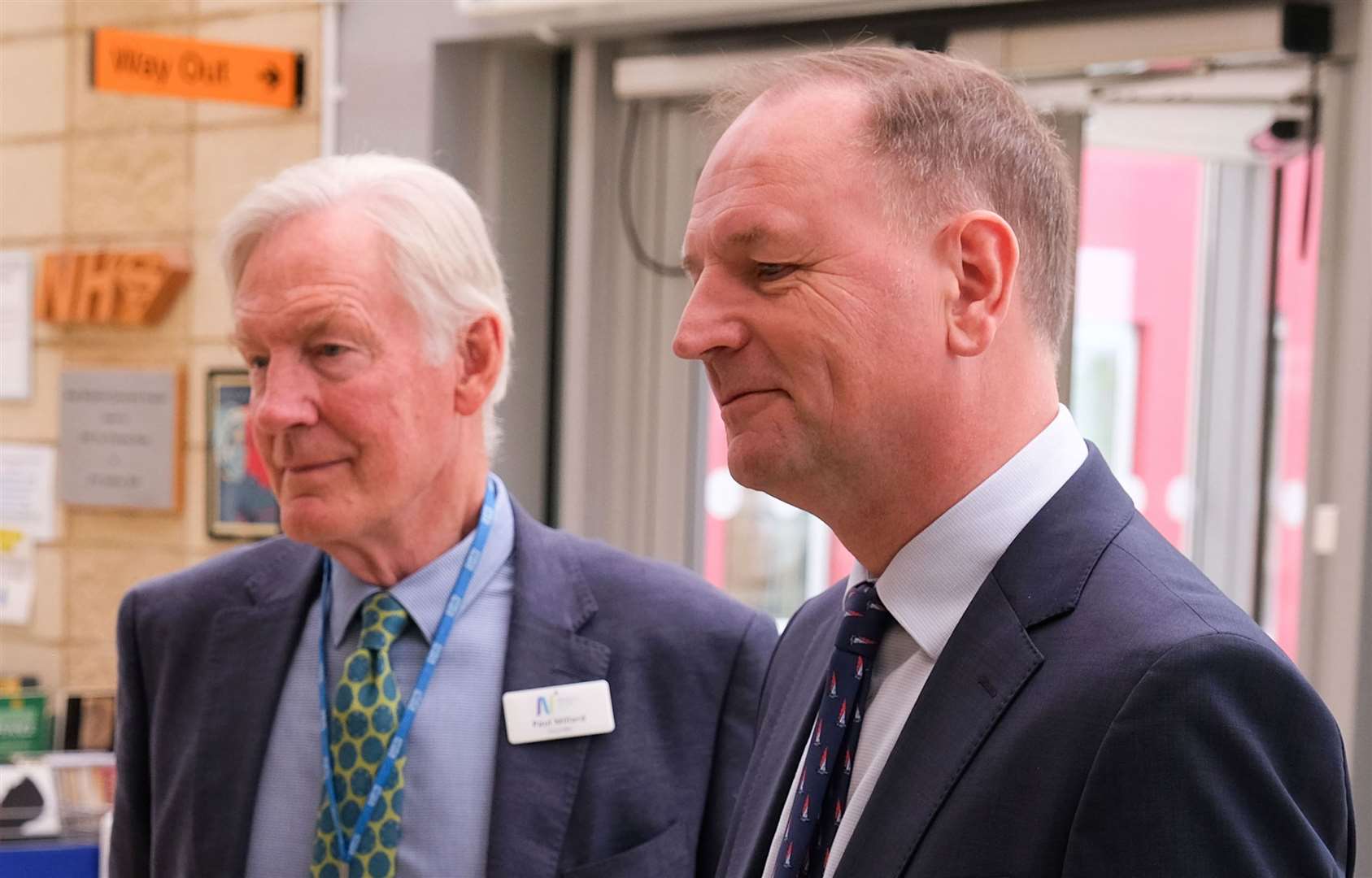 Lord Stevens, right, listening to staff at West Berkshire Community Hospital