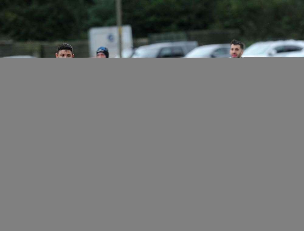A Slough player is tackled by the Hungerford full-back