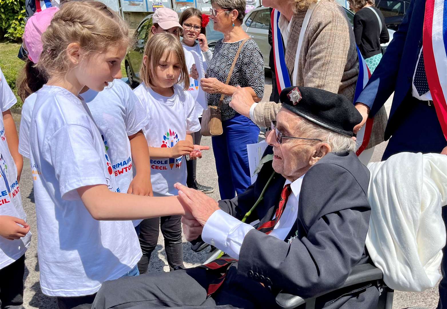 Cecil Newton Primary School pupils greeting Cecil at Creully. Credit: Mirek Gosney