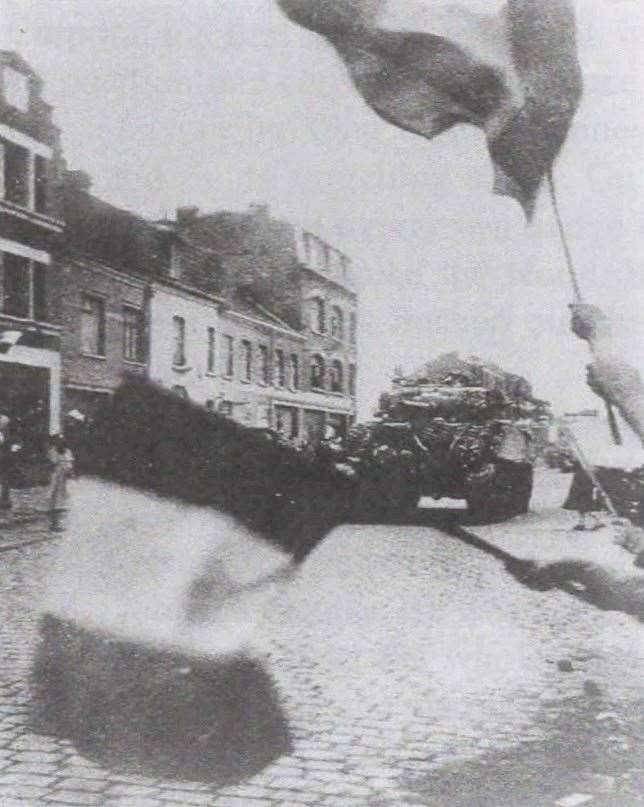 Mr Newton and his tank crew greeted by French citizens while on a reconnaissance mission of Lille in September 1944