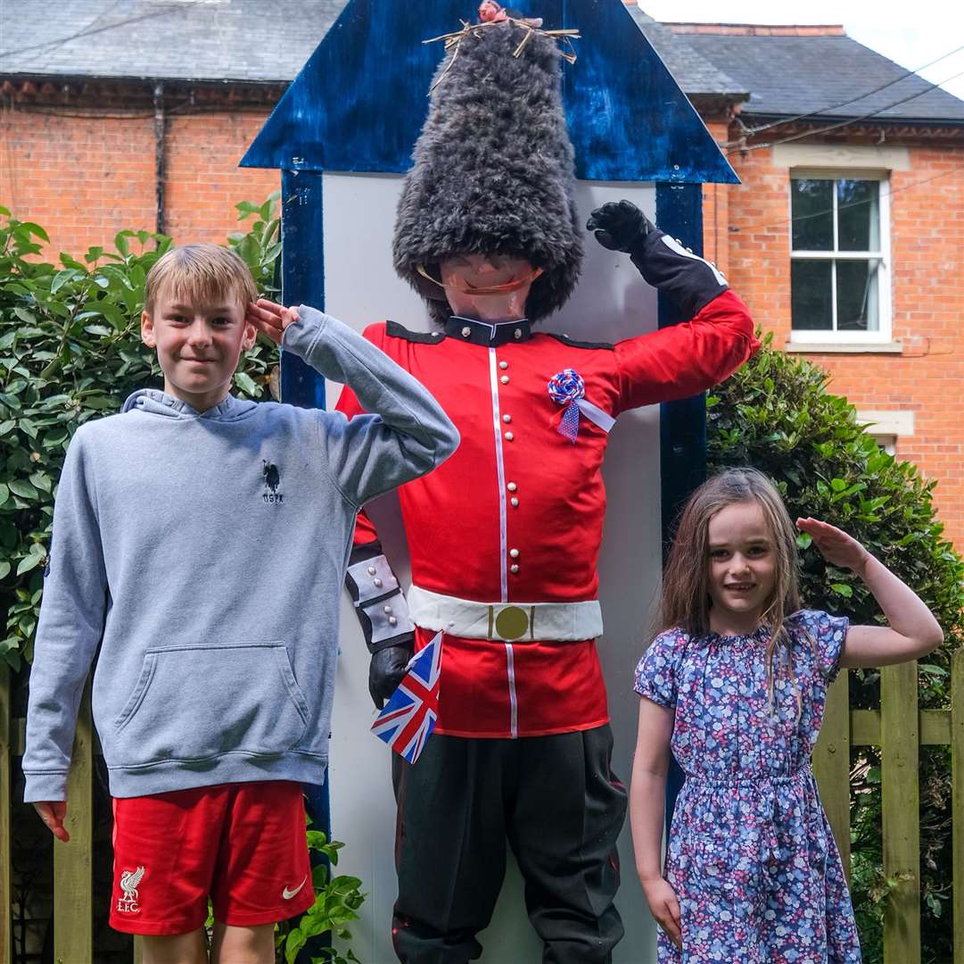 Will Tucker, 11, and Isabel Tucker, 6, with their Grenadier Guard