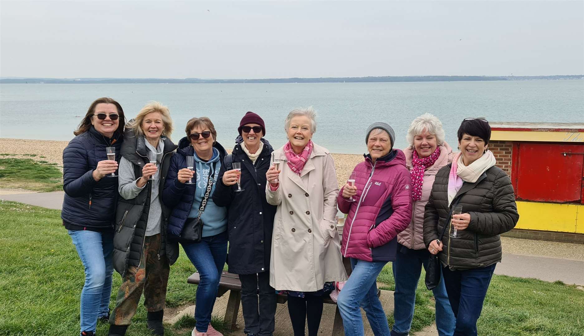 Ms Funnell (in the cream coat) with members of the Pink Place ladies group (56702673)
