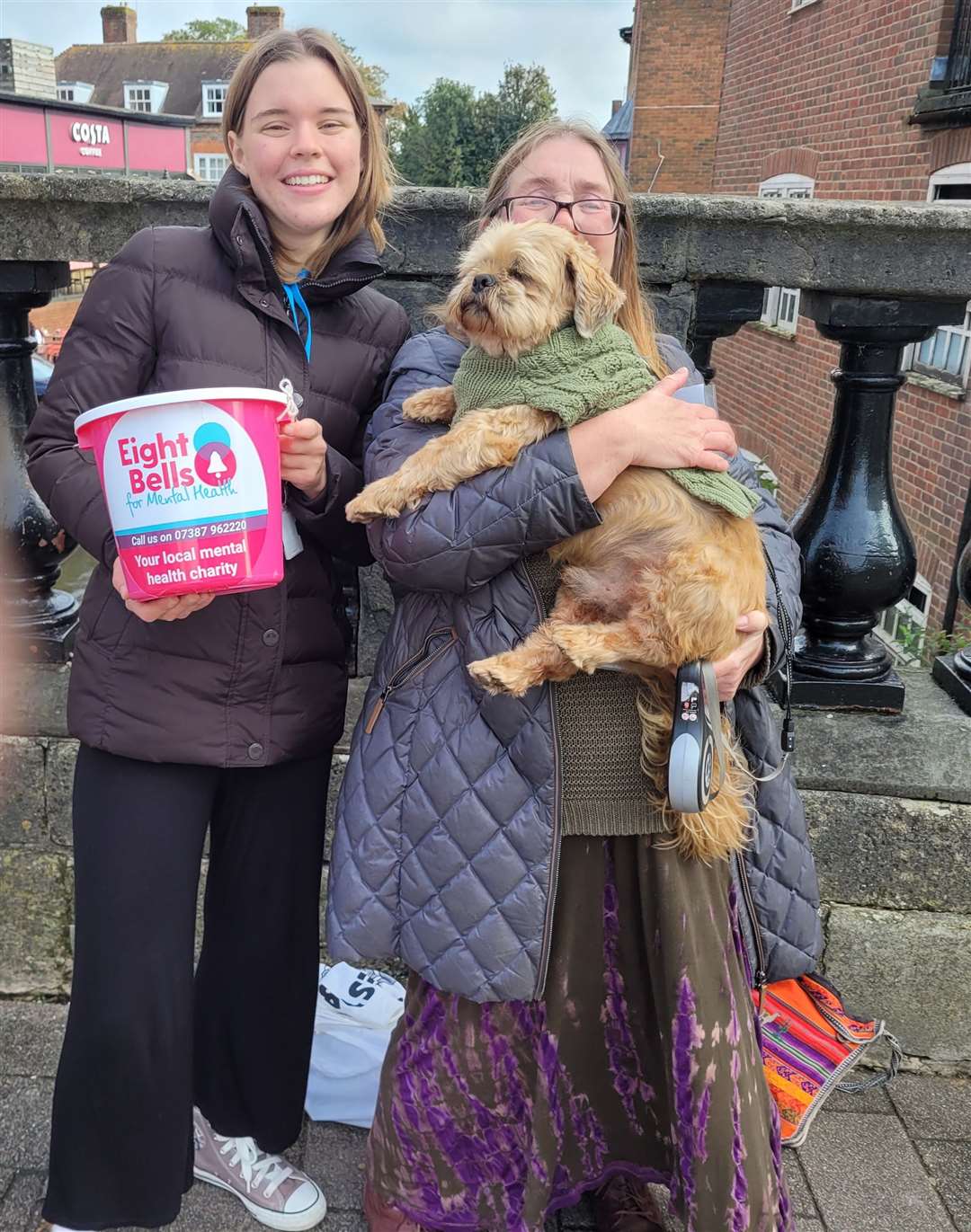 Eight Bells members Emily, Rachel and Sampson collecting on the bridge in Newbury