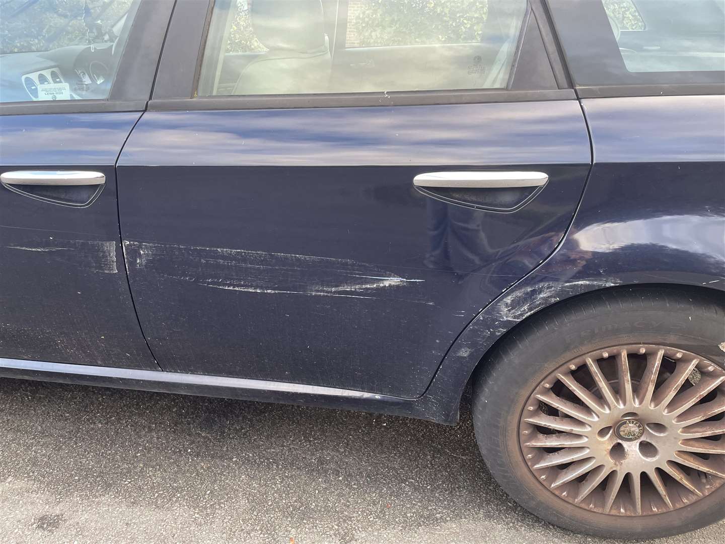 Scraping damage on side