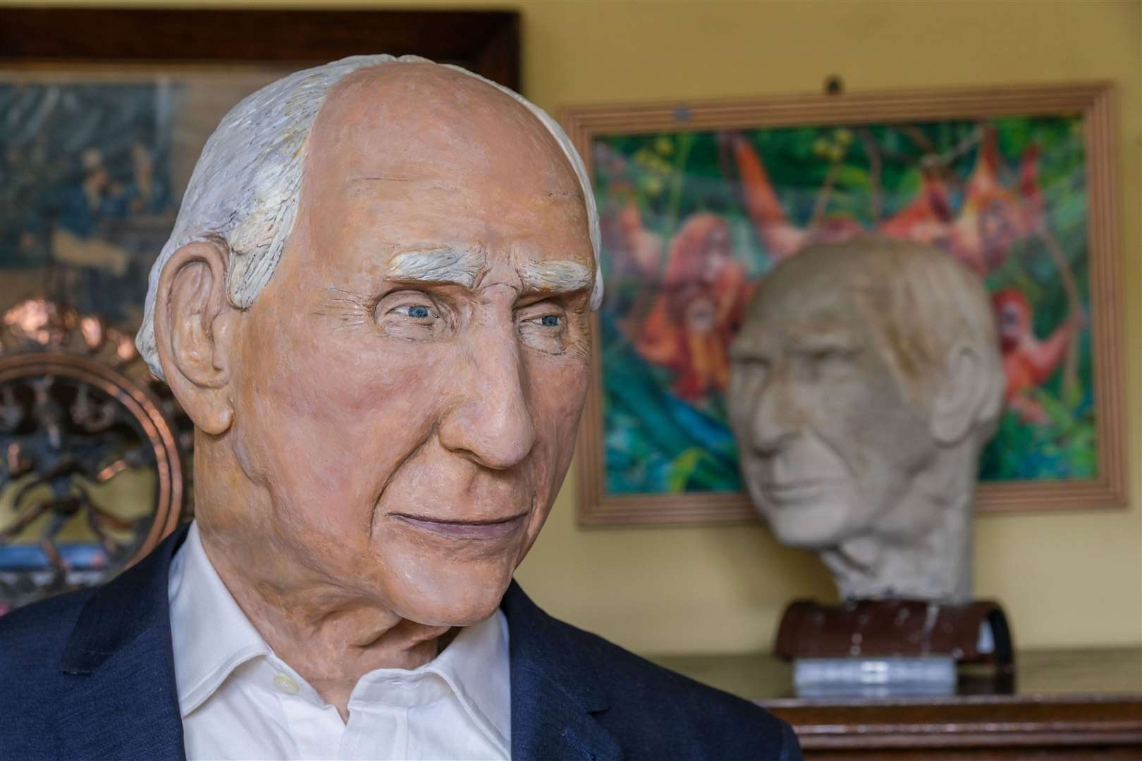 The original clay bust of the head can be seen in the background