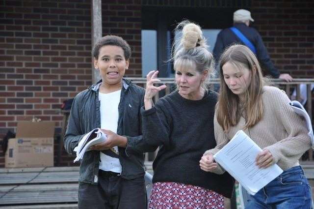 Nicky Pitts gets some Furie practice, flanked by Marley John Rose as Perseus and Mia Pitts as Athena