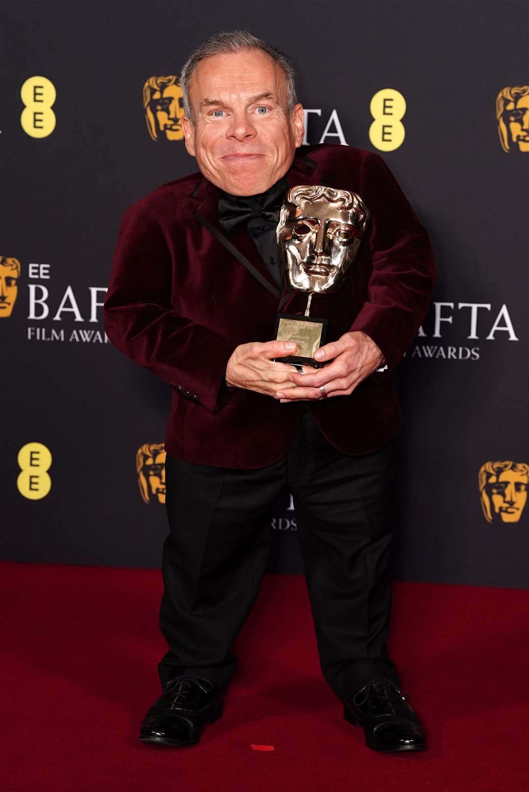 Warwick Davis paid tribute to his wife after winning the Bafta Fellowship Award this year (Ian West/PA)