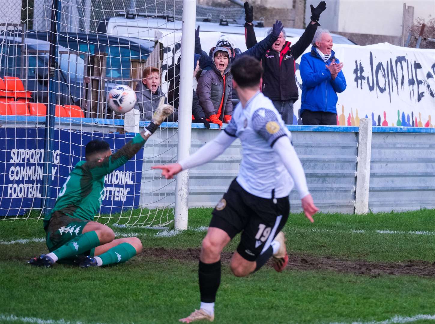 Ward wheels away to celebrate after slotting in Hungerford's opener
