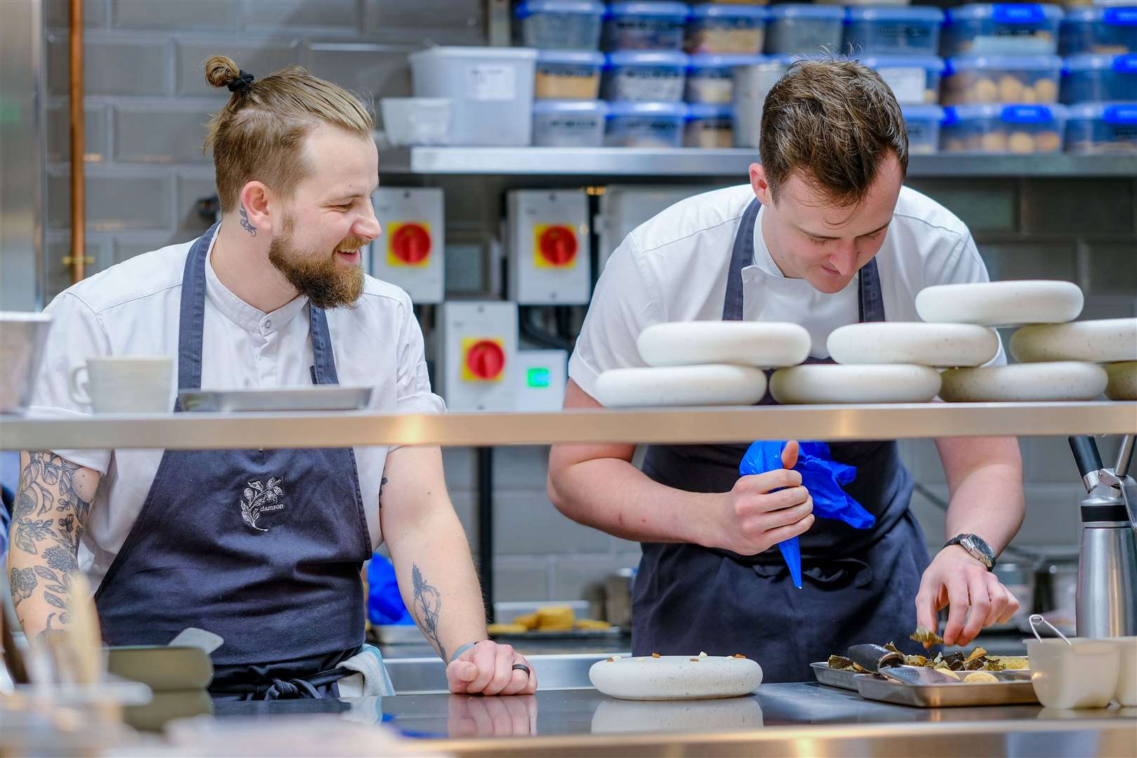 Chef Henry Kremer-Ireson (left) in the Damson kitchen