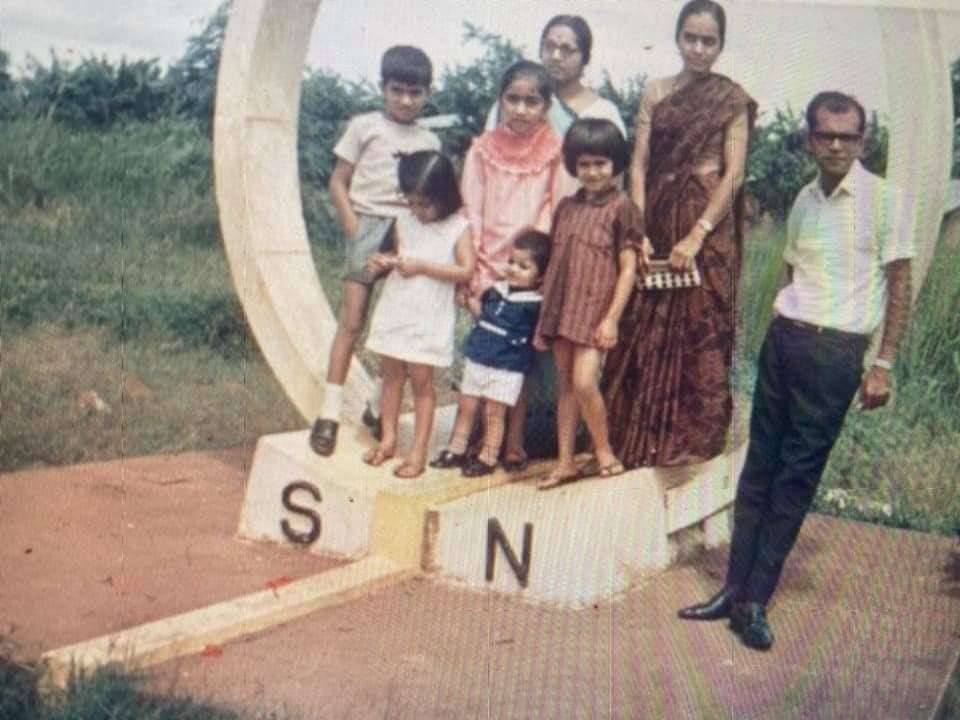 Pragna Hay, front in white dress, with her family at the Equator pre-expulsion