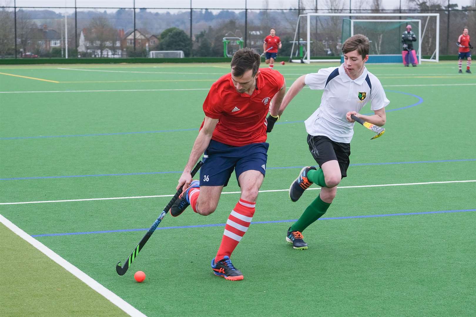 A Newbury player attacks down the wing