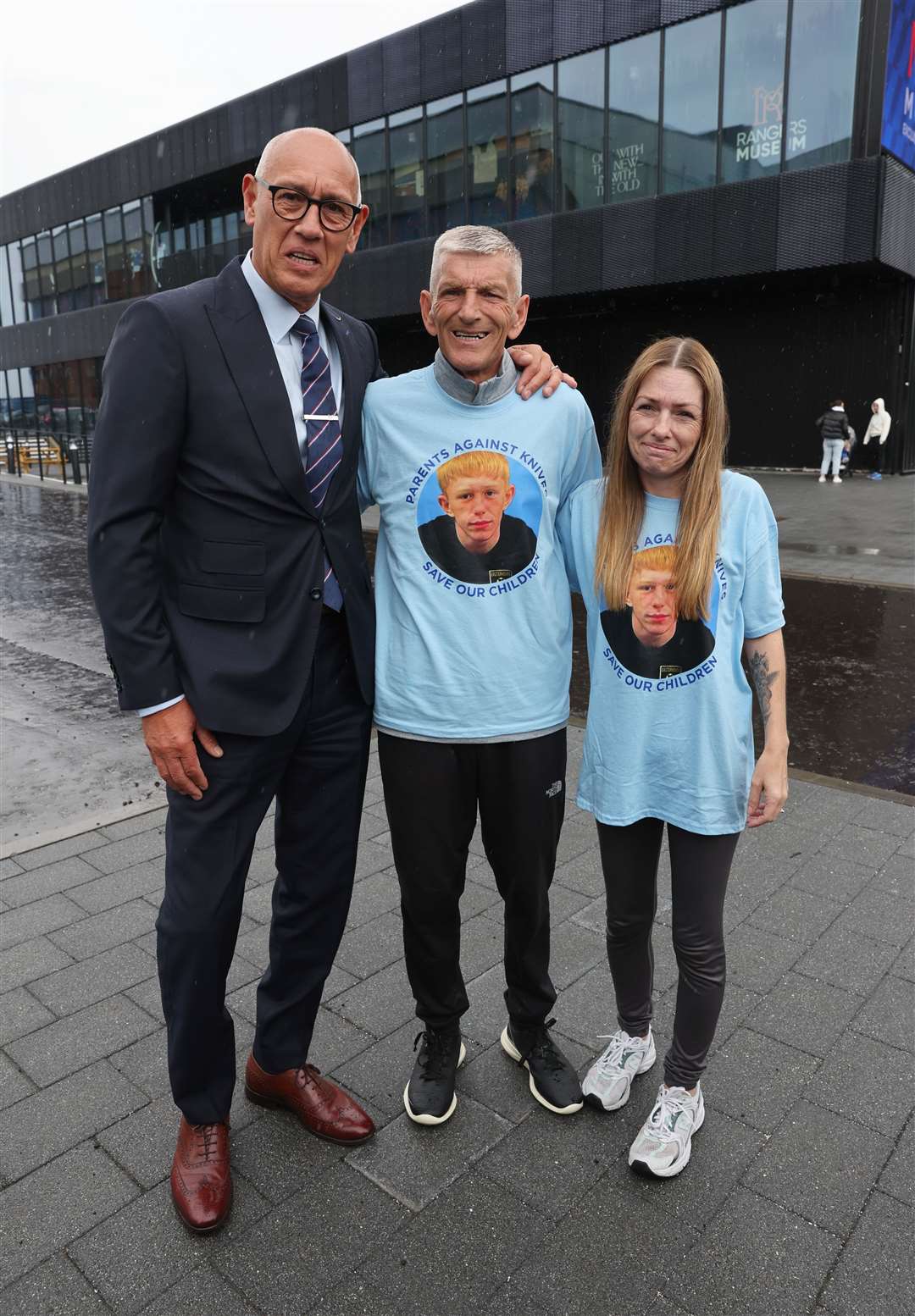 Former footballer Mark Hateley (left) with Neil and Elizabeth McCrimmon (Robert Perry/PA)