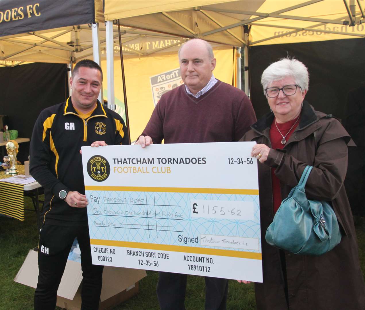 Club Chairman, Gareth Hillen with Fanconi Hope’s Colin and Debbie Waters who were presented with a cheque from Thatcham Tornadoes. Picture: Thatcham Tornadoes