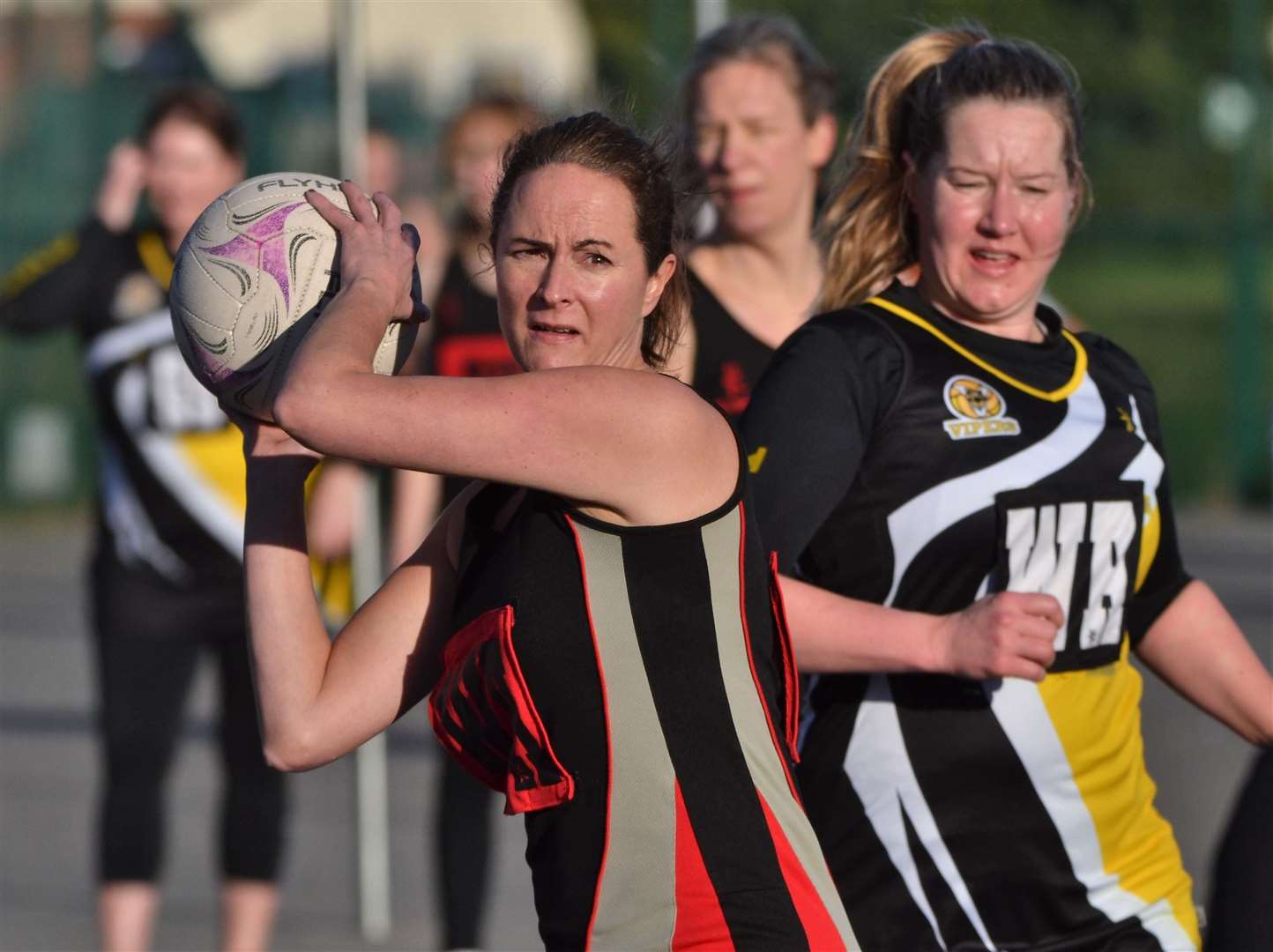 A Newbury player tries to find a pass