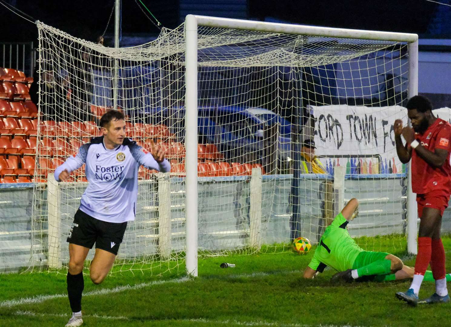 Centre-back Jack Wright wheels away in celebration after opening the scoring
