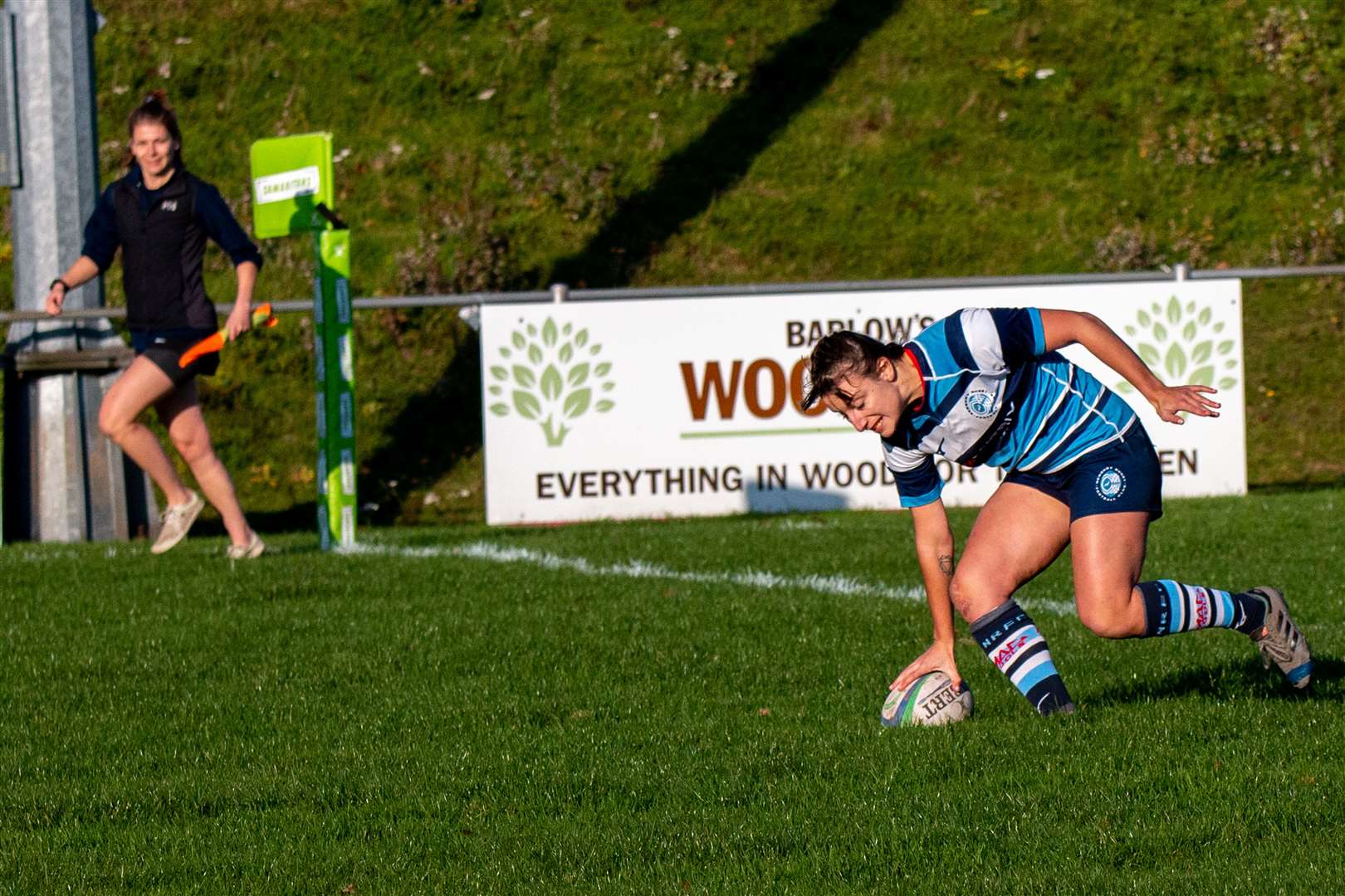 Lizzie Harris scores. Pic: Sophie Rothwell and Alastair Gray
