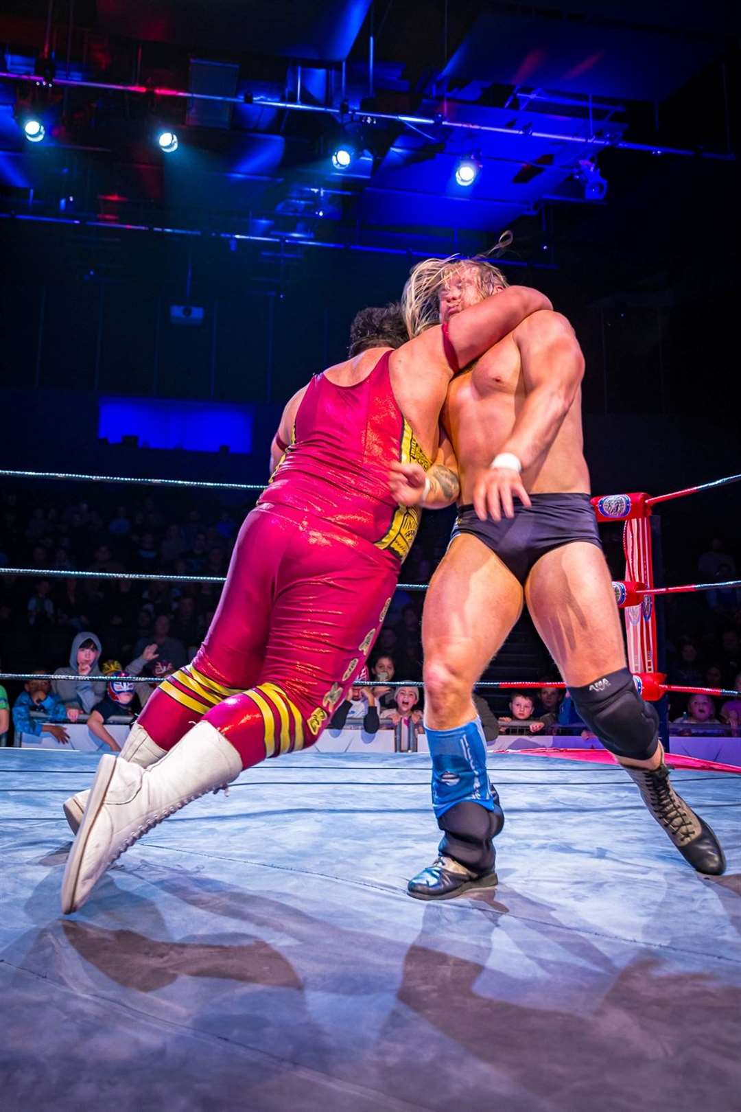 Saime Sahin clotheslines Chris Bronson at a British Kingdom Pro Wrestling event in Thatcham - Photo: Emma Meek