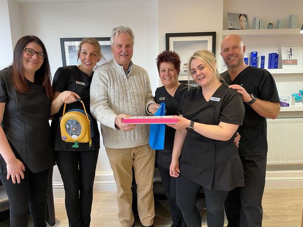 Andy How (centre) thanks staff at Smile Studio - from left to right, Laura Annettes, Tia Dunne, Theresa Merritt, Rachael Curtis and Charl du Toit