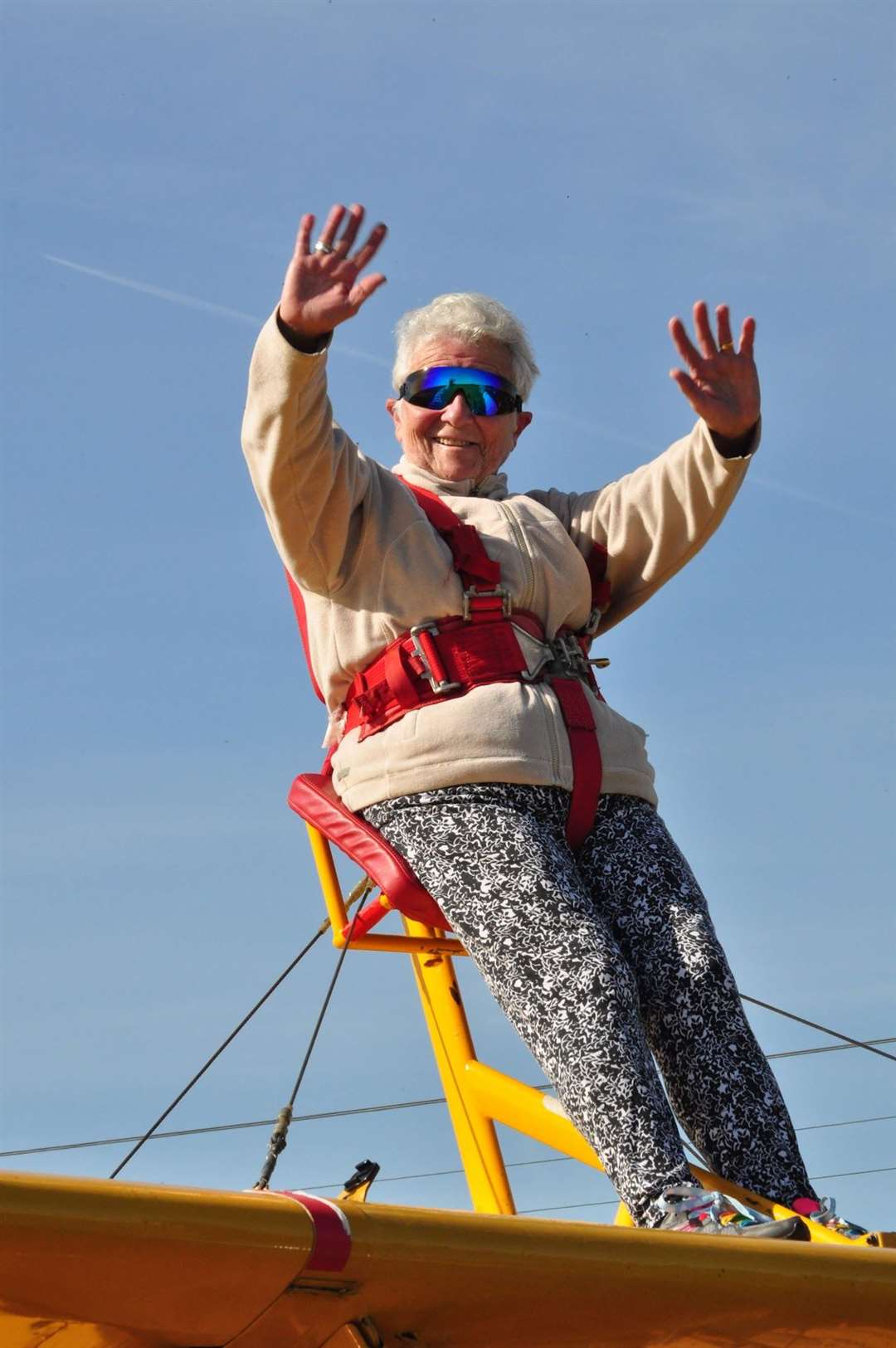 Teresa Dykes wing walking on her 75th birthday