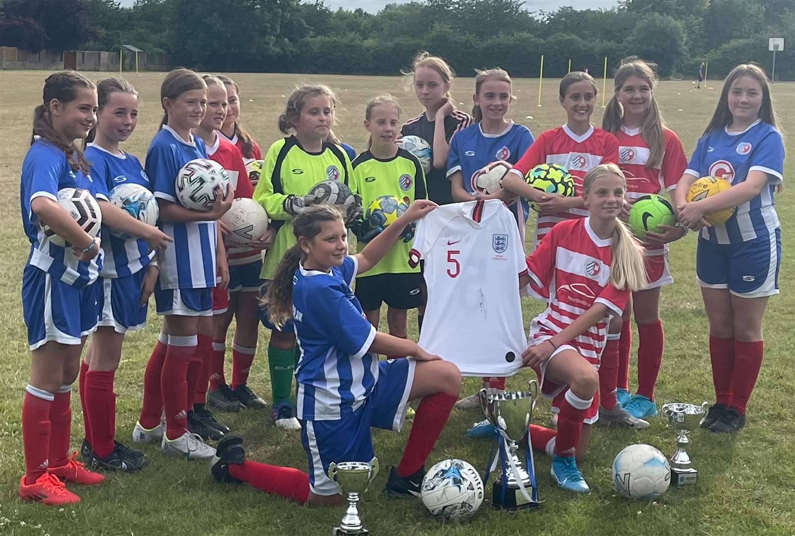 Thatcham and Newbury Town U11s with a signed Alex Greenwood shirt. Picture: Richard Matias