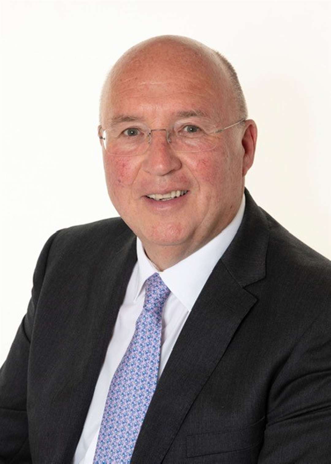 Q Associates founder and managing director David Cue
