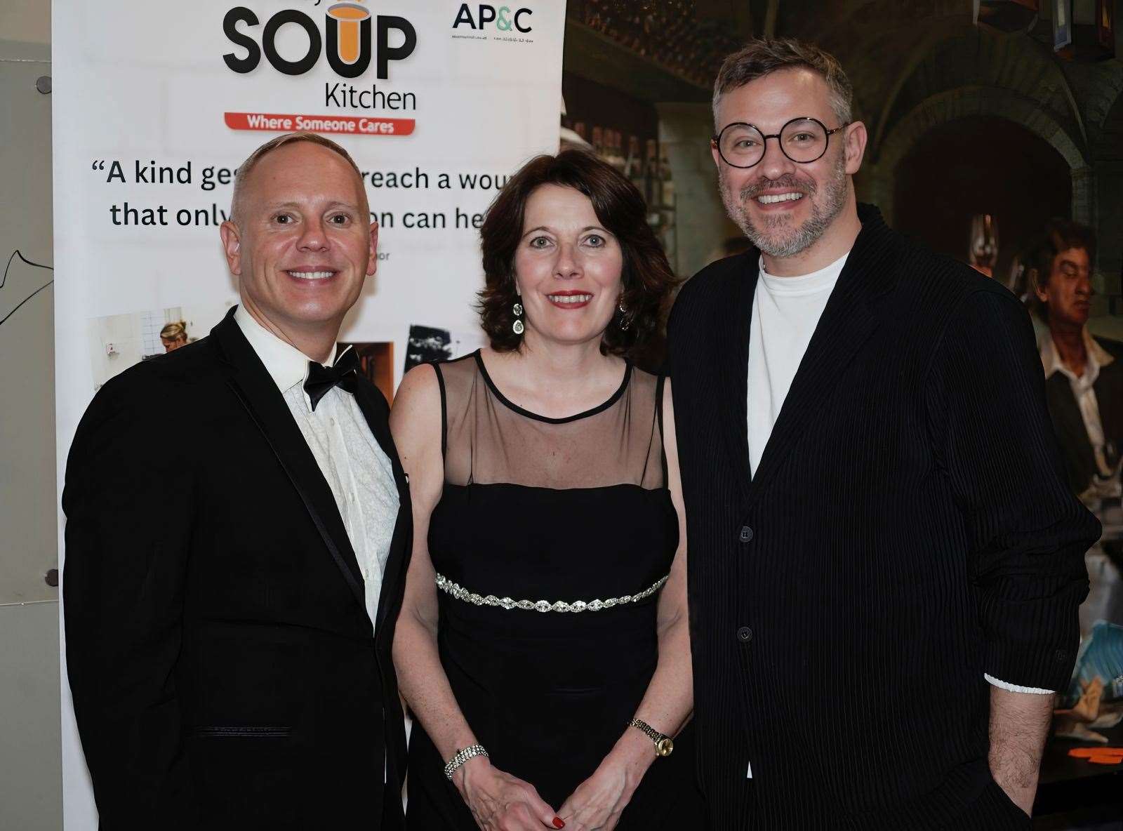 Rob Rinder, Newbury Soup Kitchen chief executive Meryl Praill and Will Young