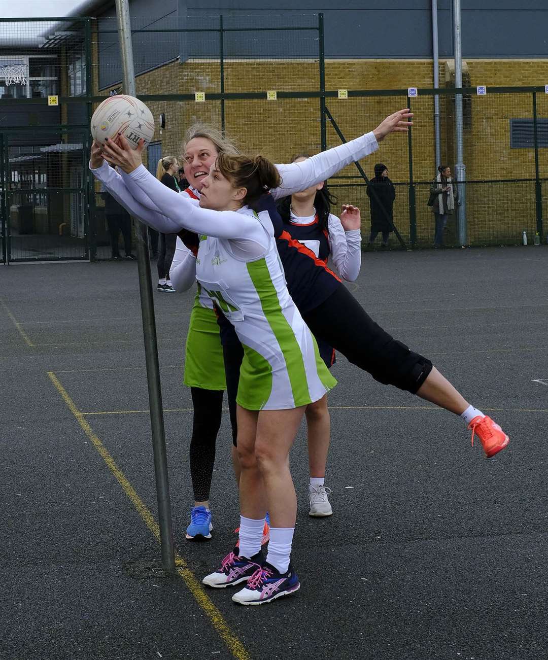 A Roots player tries to keep the ball in play