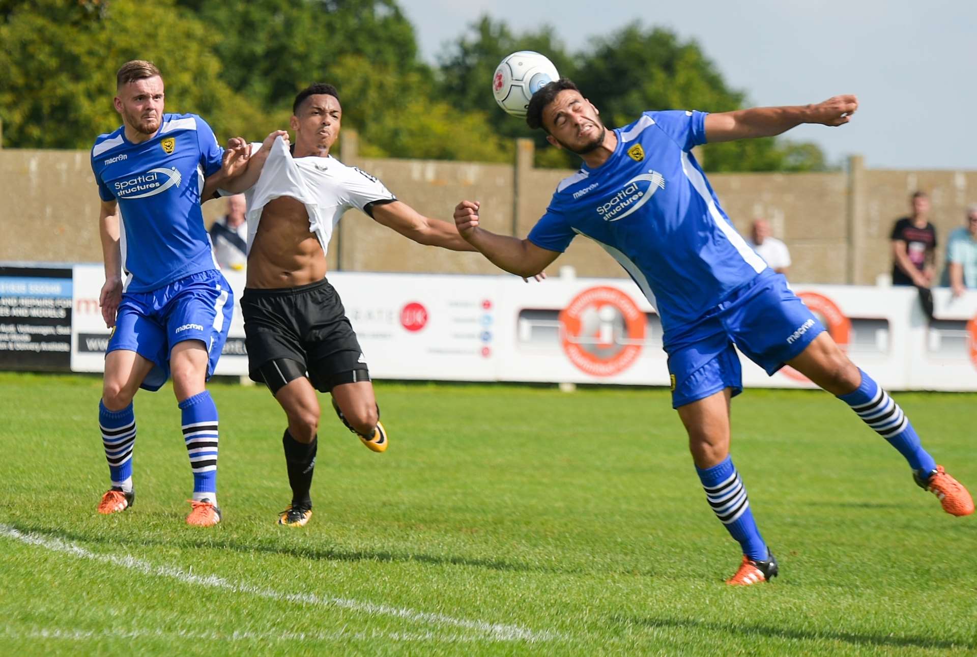 Stefan Brown gets a shirt-tug during last week's game with Gloucester City