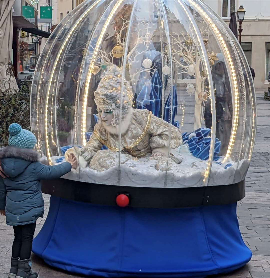 The Living Snow Globe will make three appearances in Parkway Shopping on Saturday