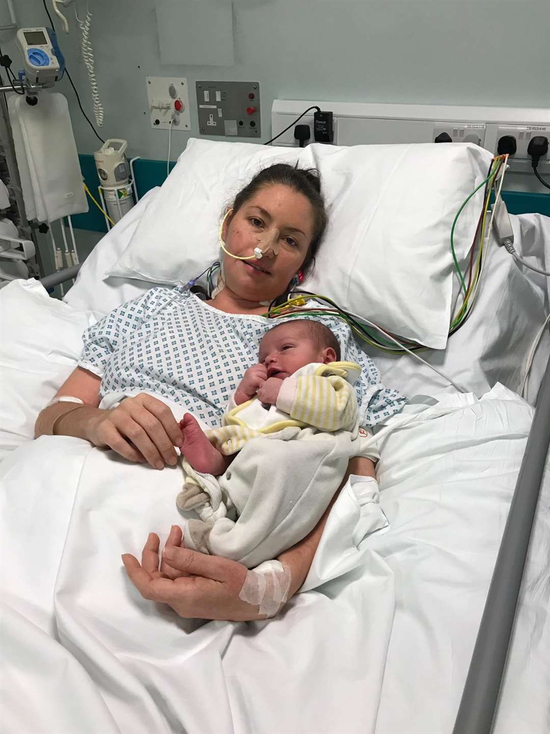 Shelly Young, 33, in hospital with newborn Maxwell Young. Picture by: Irwin Mitchell. (52936893)