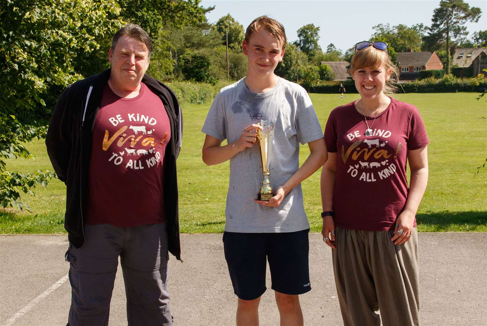 Henry Read-Denness completed his 1,000-mile challenge at the Acland Hall in Cold Ash, receiving gifts and a trophy from Viva! local contacts Mike Busby and Jess Nunn