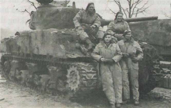 Cecil, front left, with his Sherman tank crew on the Dutch-German border in November 1944