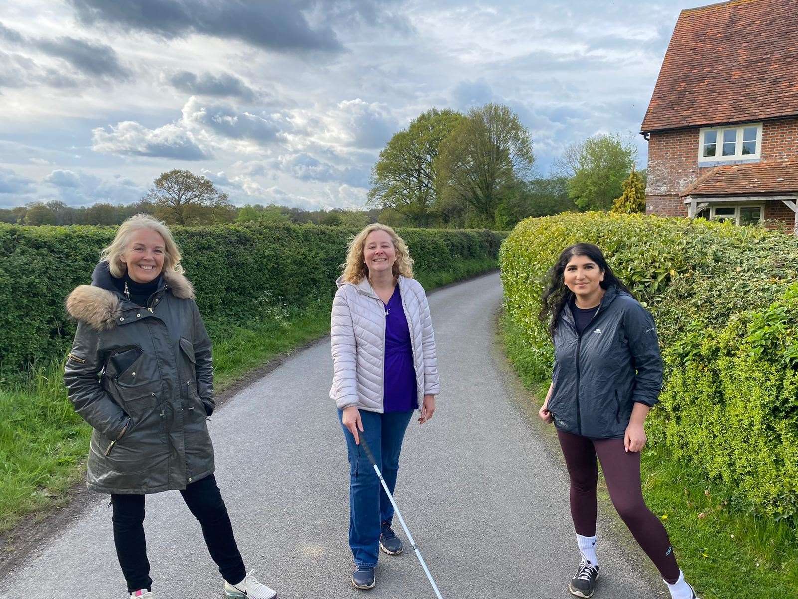 Liz Jackson MBE (centre) with former BCMS client Alison Cooper (left) and BCMS colleague Apeksha Tanna (right) on one of her 5k walks