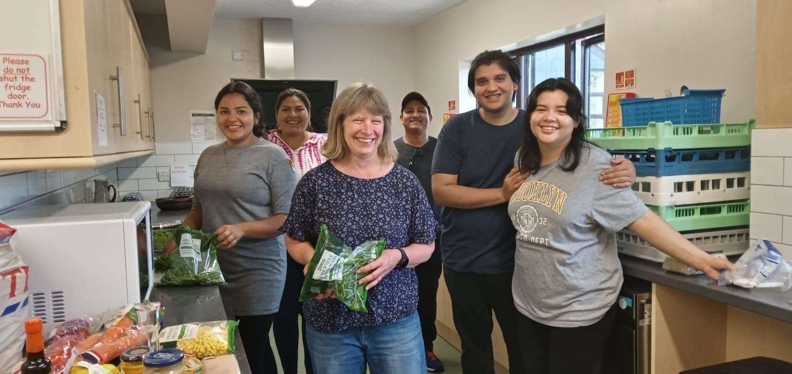 Carol Collis with some of the asylum seekers. Picture credit: Carol Collis