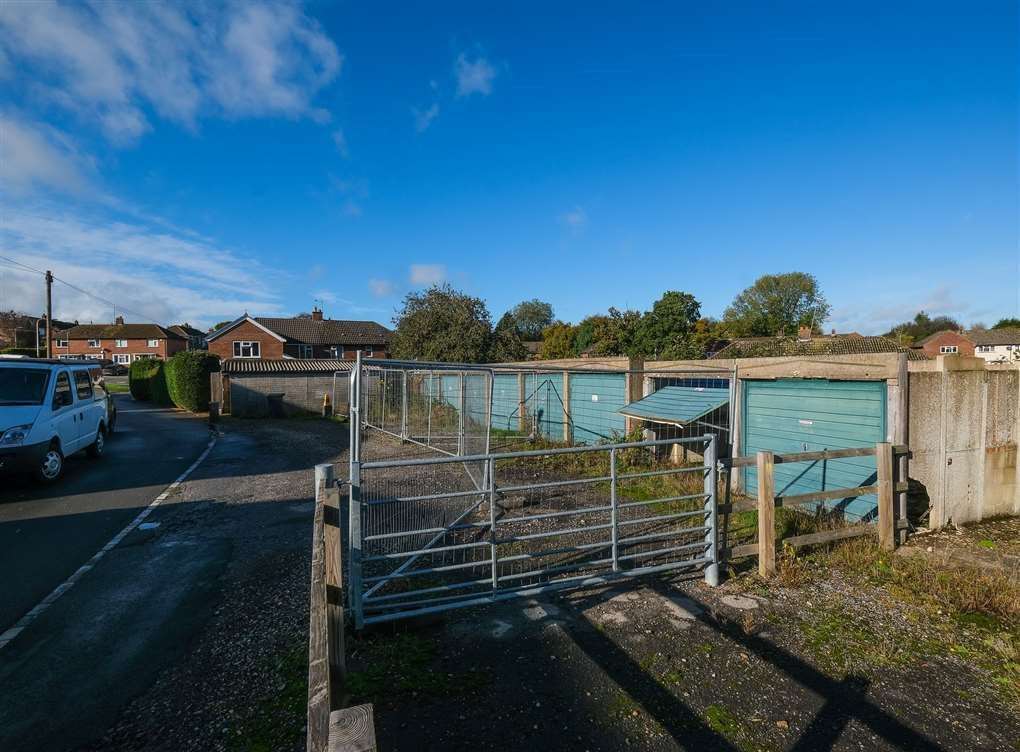 Plans to build on disused garages in Pond Close are back on the table