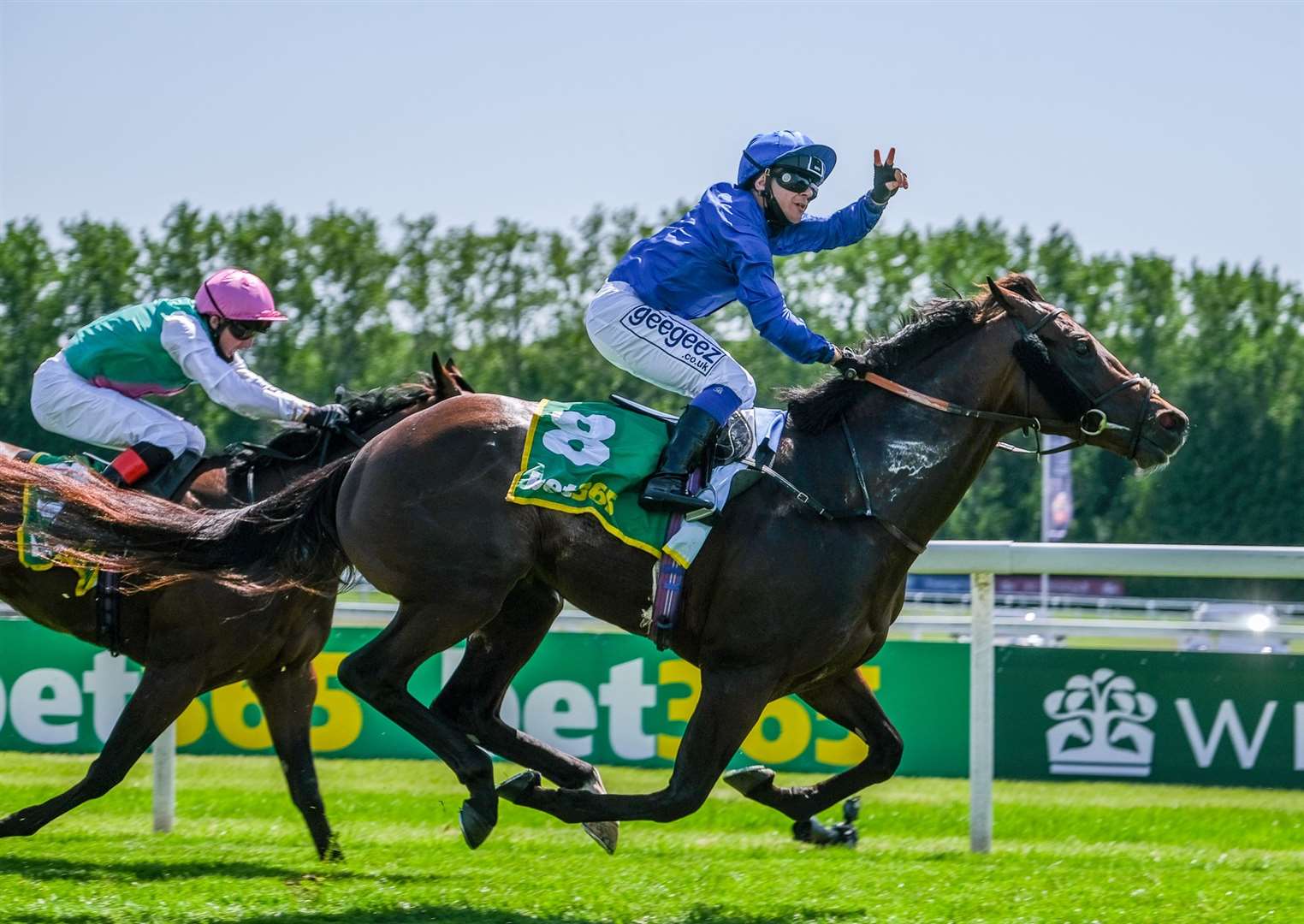 Marco Ghiani celebrates as Real World wins the bet365 Stakes
