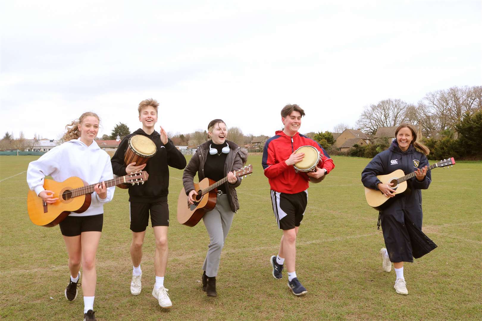 Pupils showing their support by playing a range of musical instruments