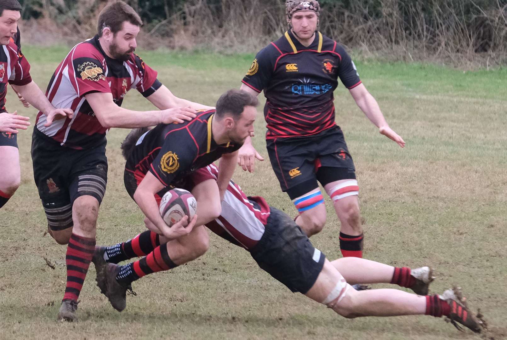 A late tackle is made in the match
