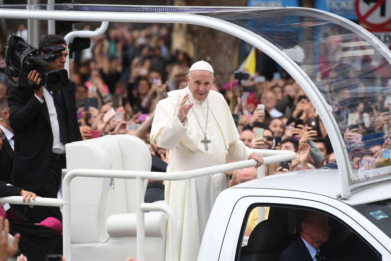 Pope Francis waves to the waiting crowds from his ‘popemobile’ during his 2018 visit to Ireland (Joe Giddens/PA)