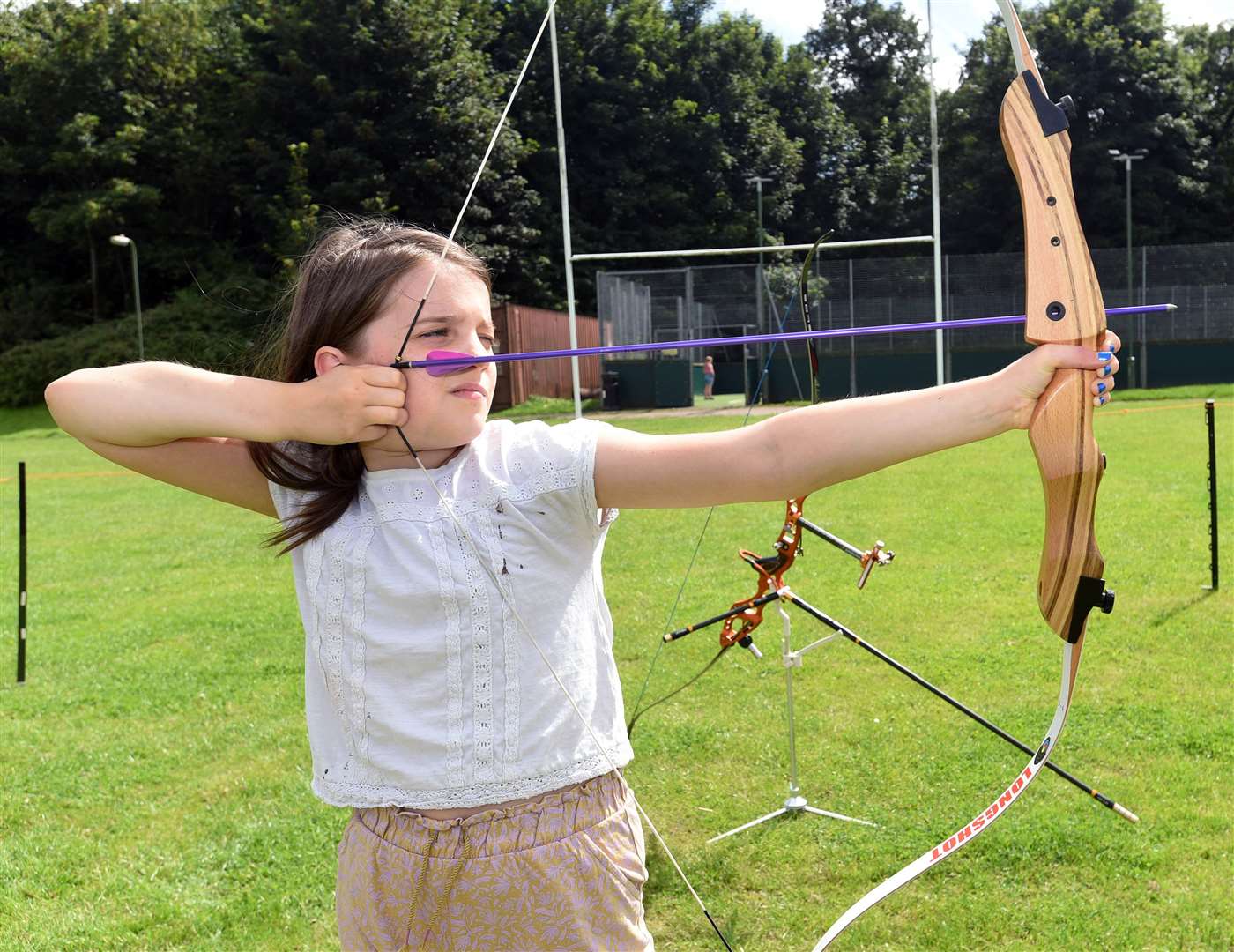 Freya Clark (10) trying archery Ref: 32-1821