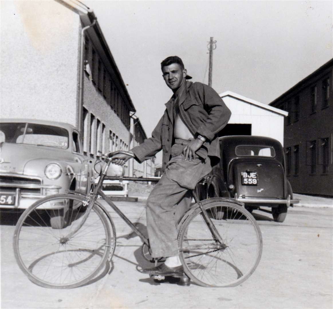 George Tiss at RAF Greenham Common in May 1953. ‘Me on my buddie’s bicycle (notice sun tan),’ writes George