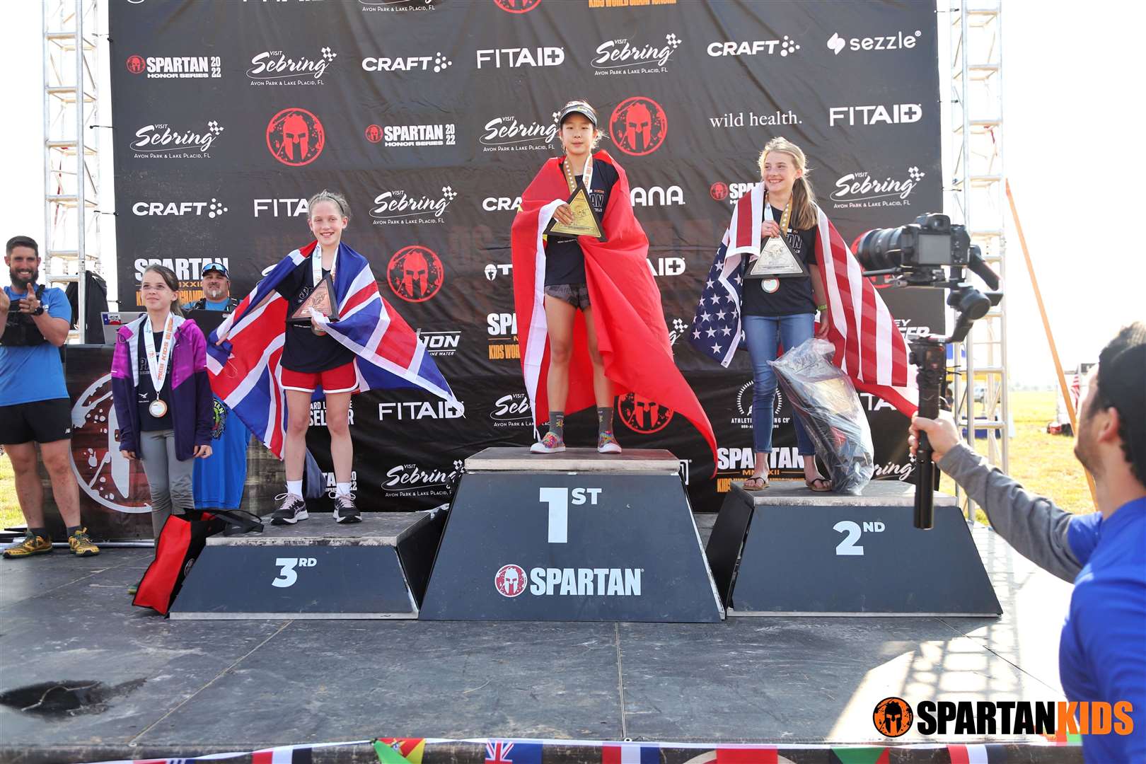 Isla Ladds (left) on the podium at the Spartan Kids World Championships