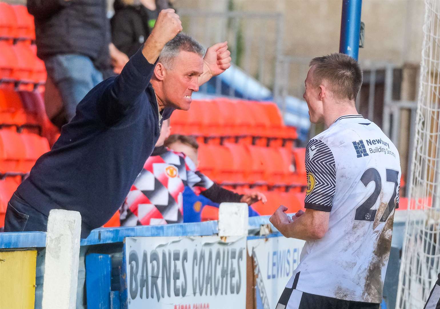 Ryan Jones celebrates his equaliser with a supporter. Pictures by Phil Cannings