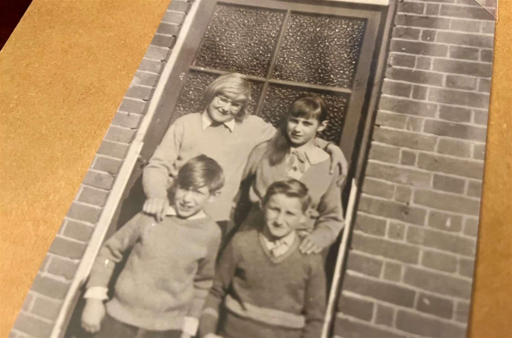 Shirley Davis-Fox, top right, standing with her four siblings outside Abbey Wells