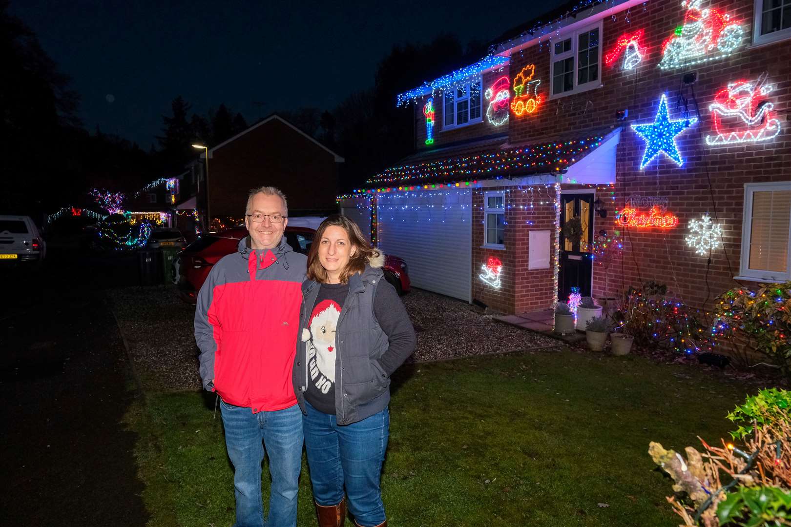 Luke and Jenny Graham in front of 22 Harwood Rise