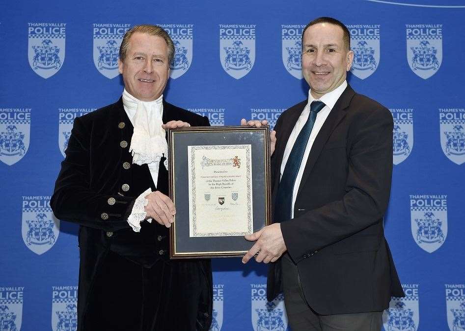 High Sheriff of Berkshire Willie Hartley Russell presents the Major Crime Unit award to Det Chief Insp Andy Shearwood