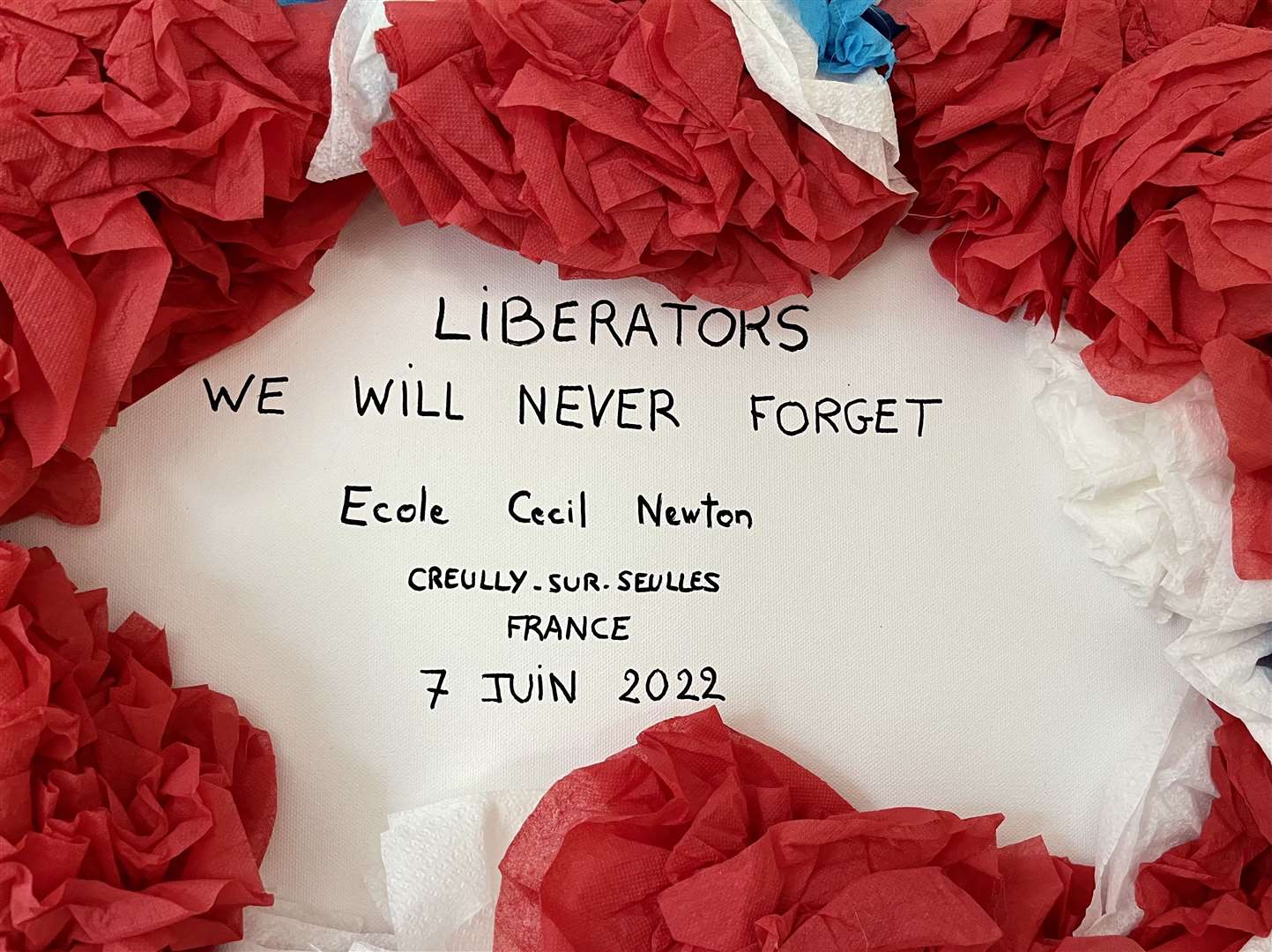A tribute to Mr Newton by the Cecil Newton Primary School in Creully sur Seulles, a French village he helped liberate