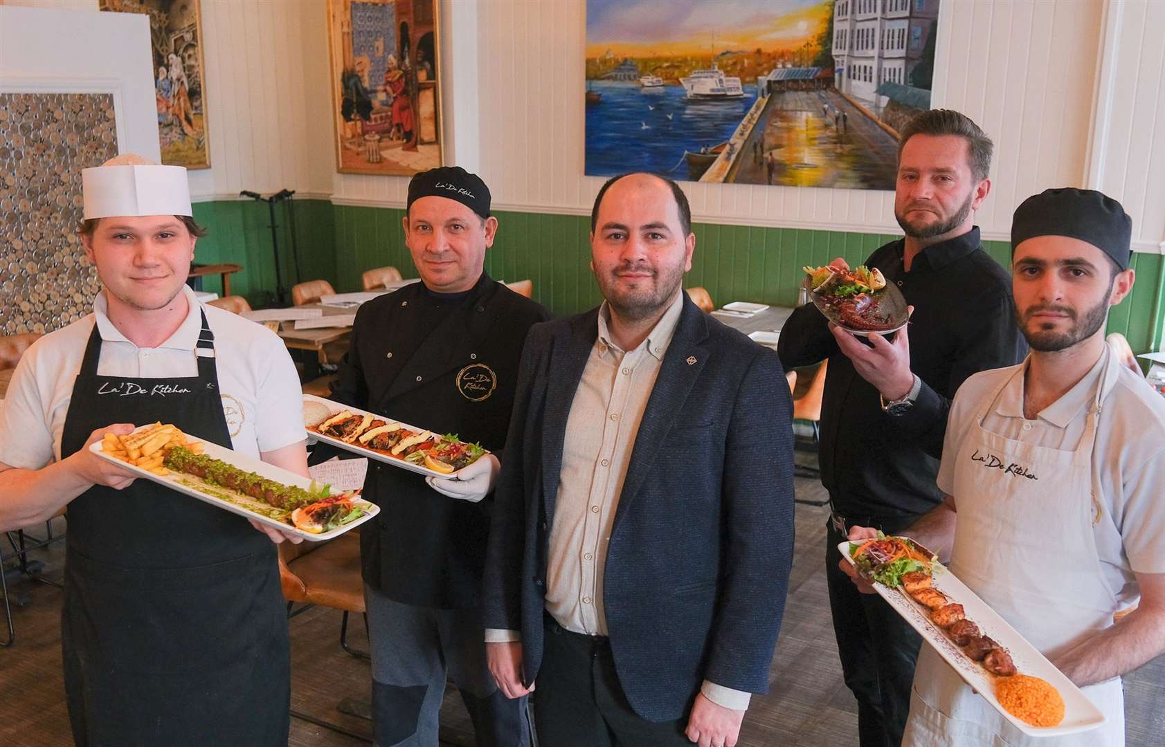 General manager Erdi Dilek, centre, and his staff