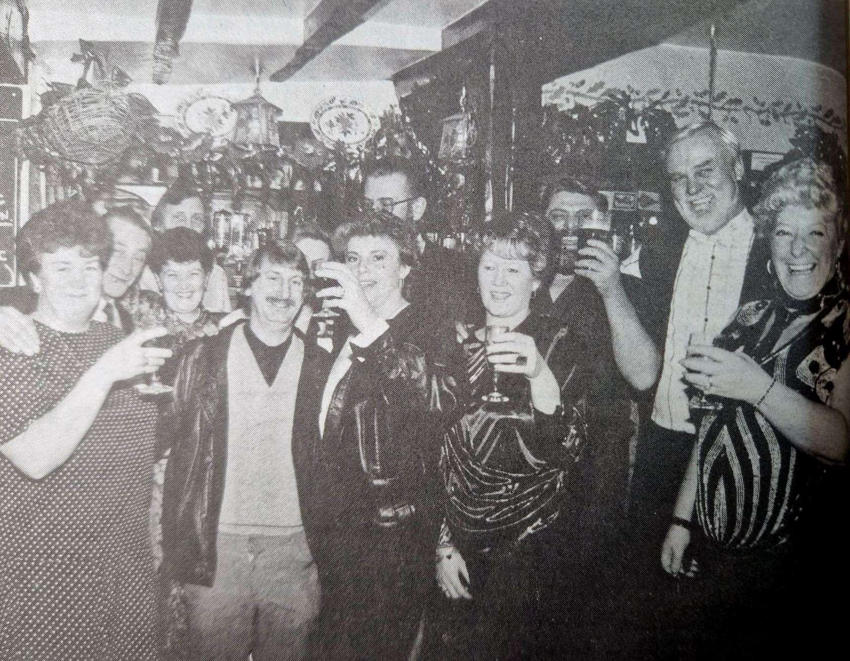 Revellers herald a new decade at the White Hart at Thatcham in 1990.