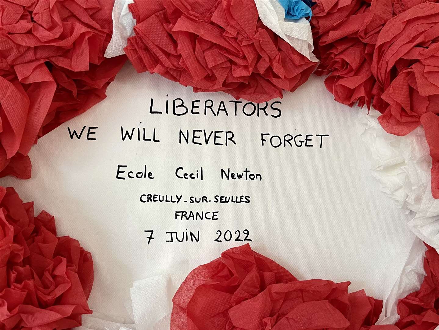 A tribute paid to Mr Newton by the Cecil Newton Primary School in Creully sur Seulles, a French village he helped liberate